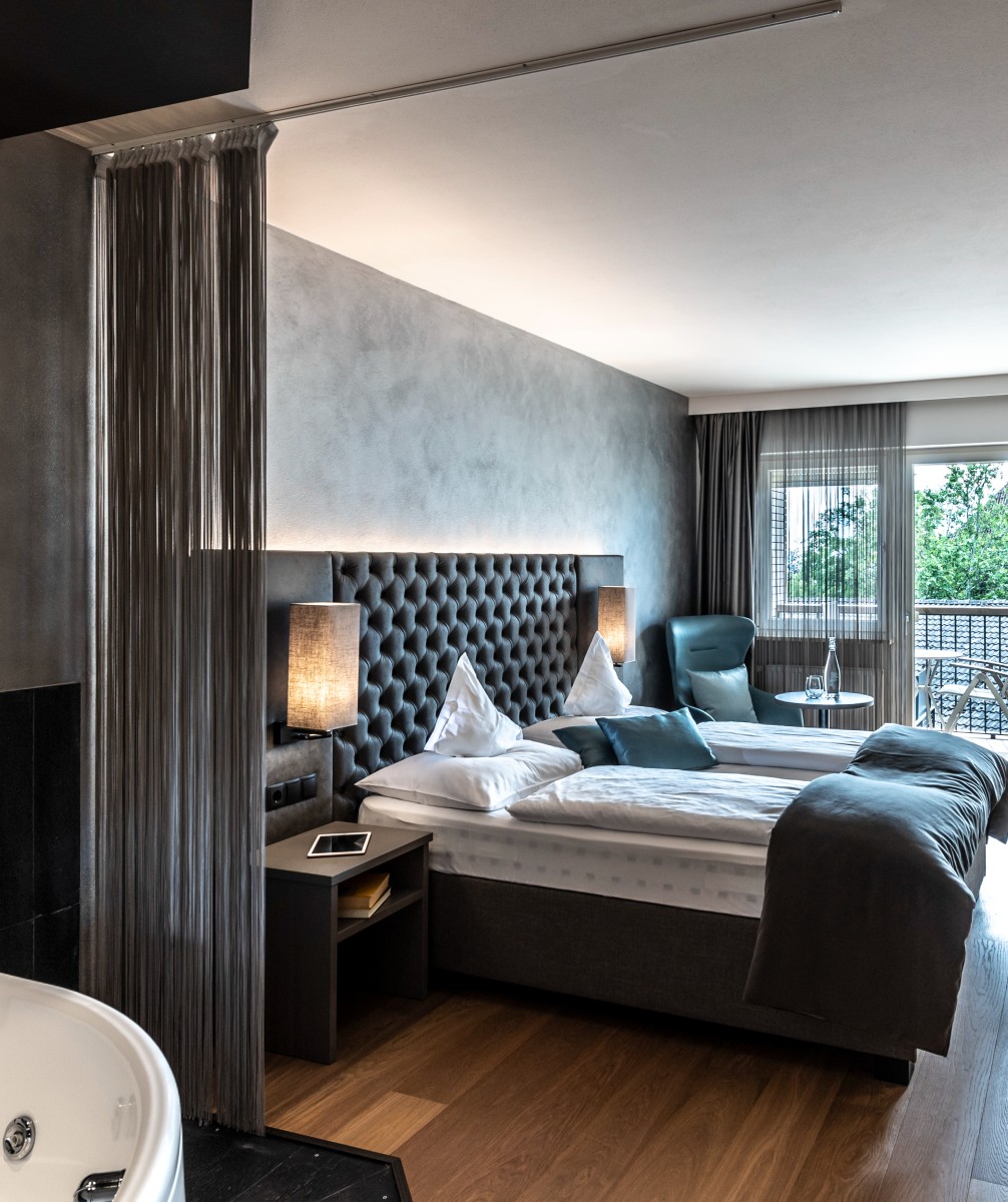 Doppelbett der Suite Aurum - Hotel das stachelburg